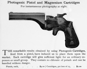 Image of Advertisement overprint: a camera flash shaped like a pistol